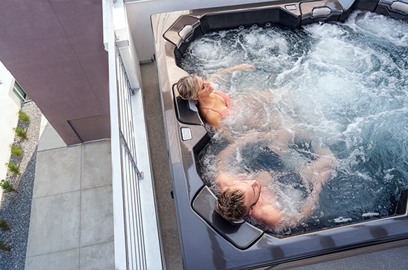 Couple relaxing in hot tub